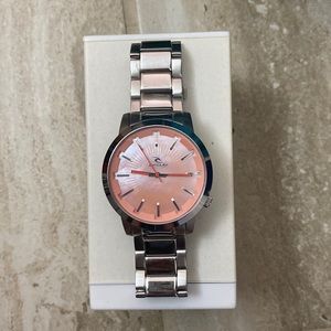 rip curl link wristwatch. coral watch face